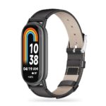 Juoda apyrankė Xiaomi Smart Band 8 su odiniu dirželiu ir spalvingu ekrano vaizdu