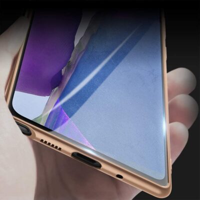 Auksines spalvos deklas Samsung Galaxy Note 20 su matomu apacioje jungciu ir mygtukais