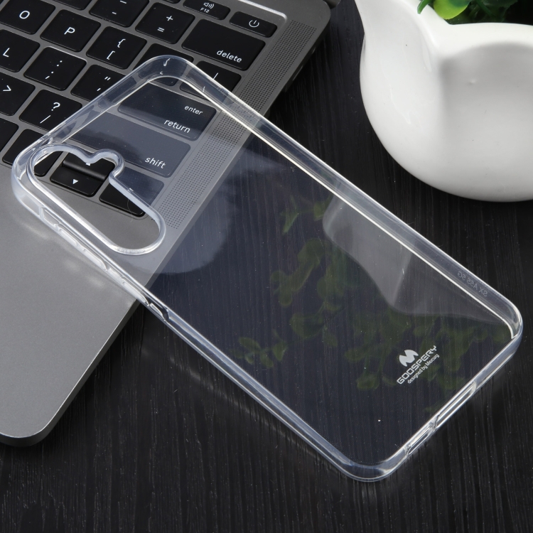 Skaidrus dėklas Samsung Galaxy A556 A55 5G Mercury Clear Skaidrus dėklas Samsung Galaxy A556 A55 5G Mercury Clear ant juodo stalo šalia nešiojamo kompiuterio